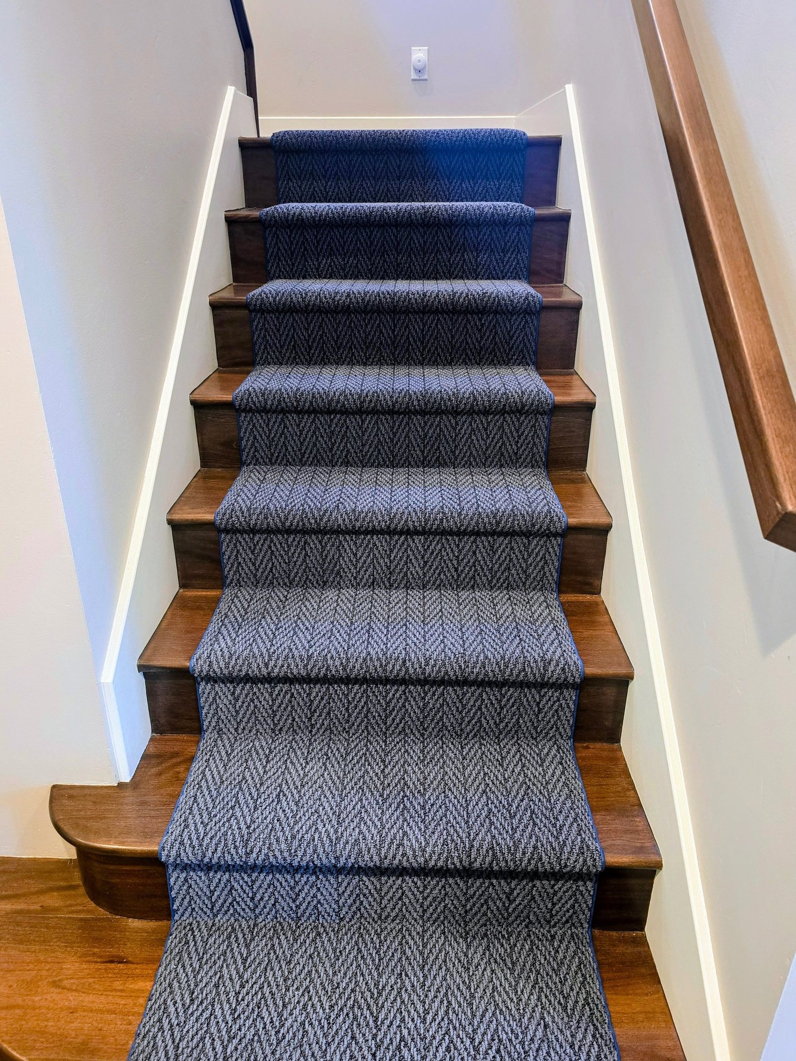 Carpet installation in residential home by flooring contractor